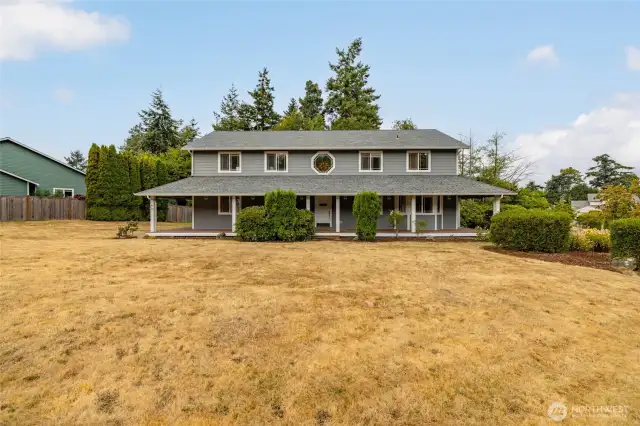 Large corner lot with wrap around porch.
