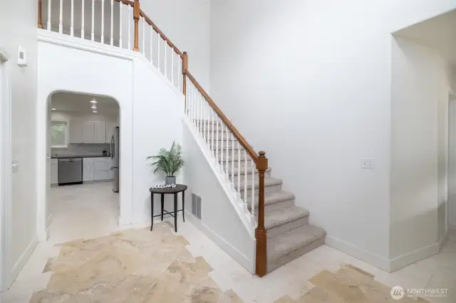 Grand foyer with a magnificent stairway.