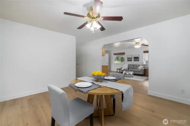 Dining room connects to the living room and the kitchen.