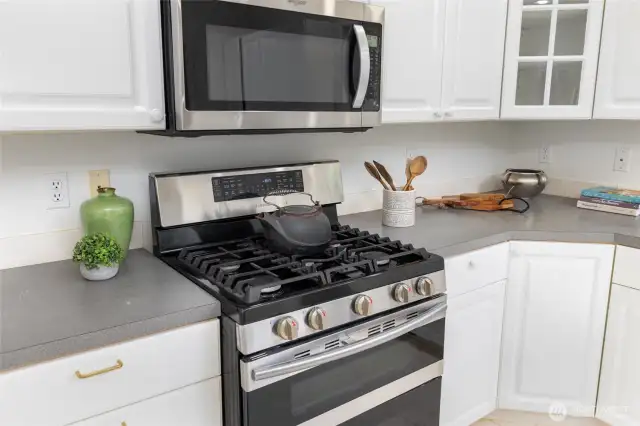 Stainless steel stove and fireplace.
