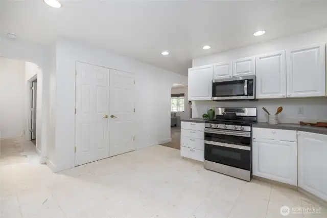 Kitchen opens to the foyer and the dining room.