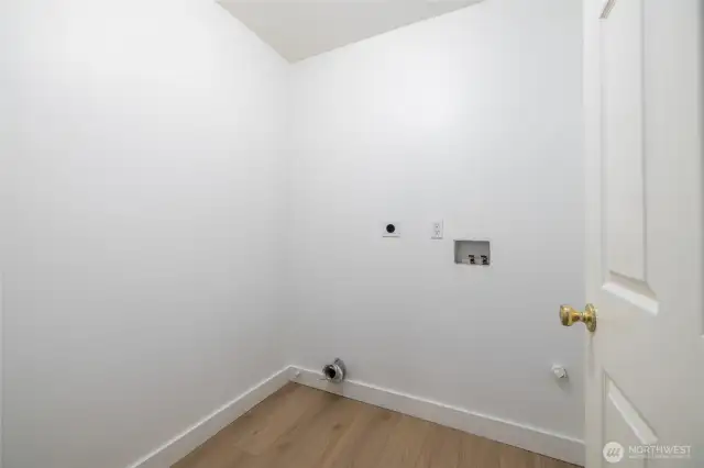 Upstairs washer and dryer room.