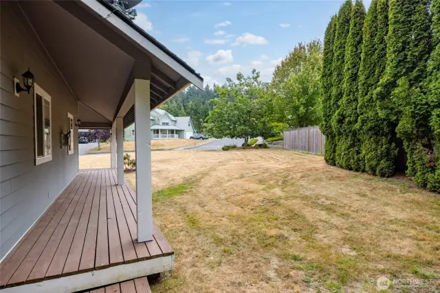 Wrap around porch and side yard.