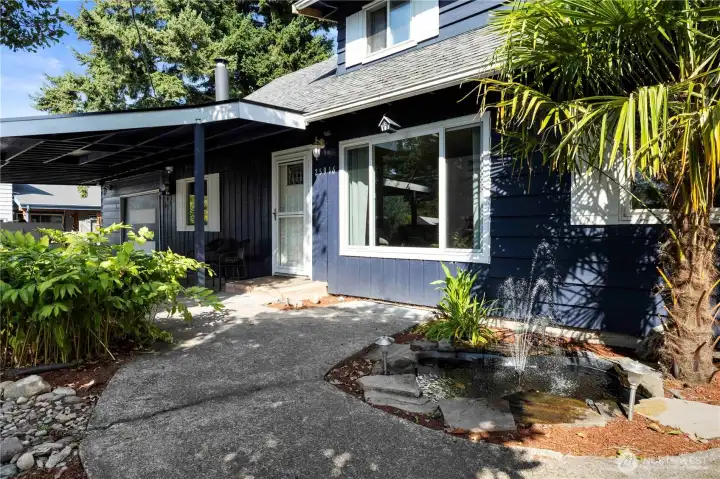 A welcoming front entry with a water feature.