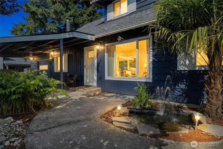 A welcoming front entry with a water feature.