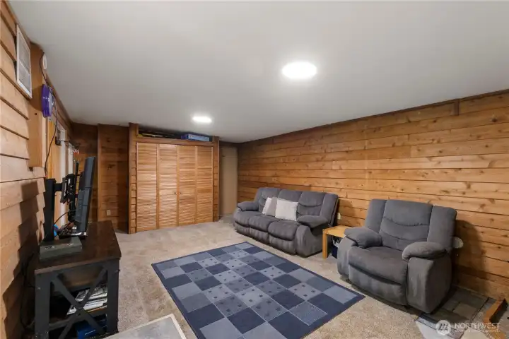 Downstairs Family room with access to the garage and back deck.