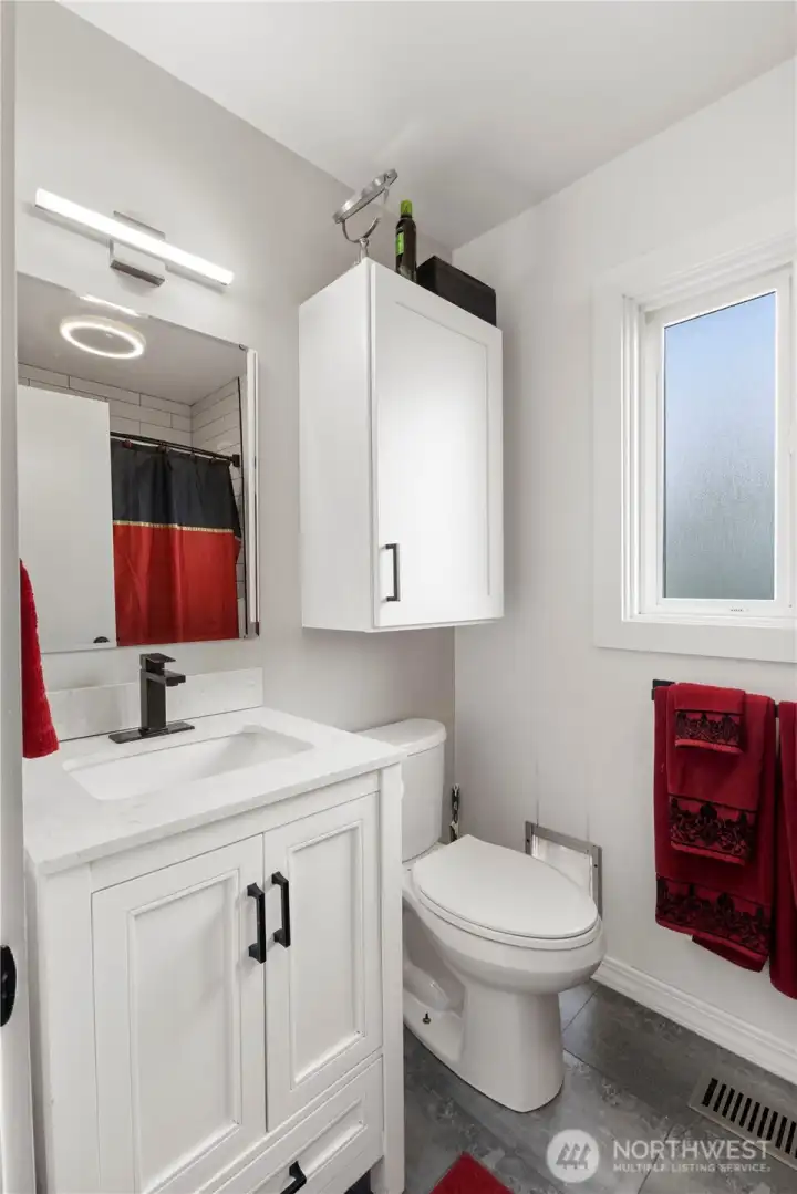 Full guest bath on the main level.