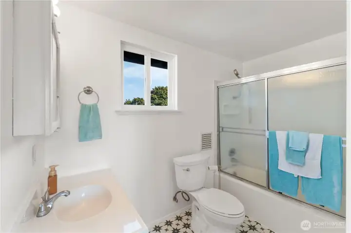 Full bathroom upstairs, just off the rec room.