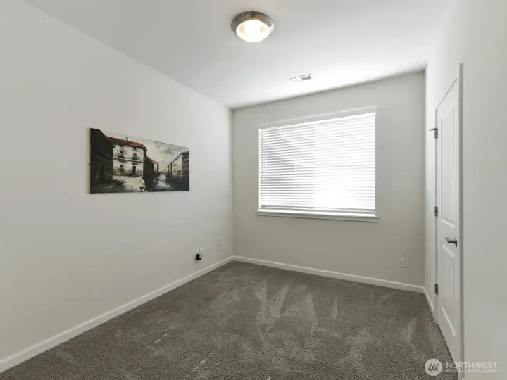 Front bedroom un staged. Extra Internet combo jacks.