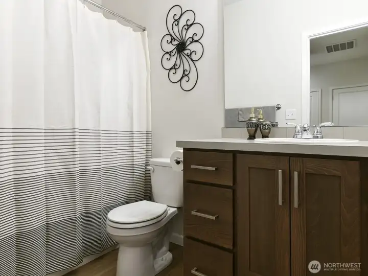 2nd bathroom has tub/shower. Granite countertops.