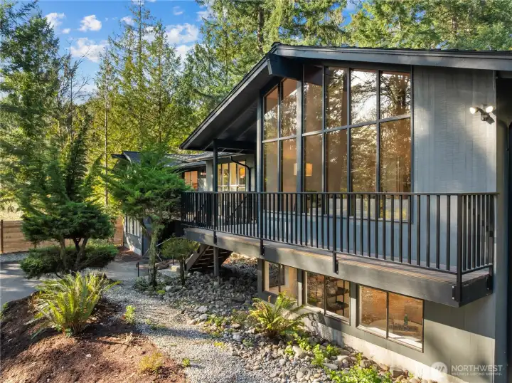 Fresh exterior paint, updated roof, and refined landscaping enhance both curb appeal and long-term peace of mind.