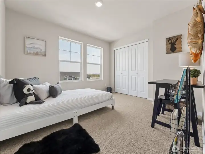 Bedroom 3.  Photos are representative