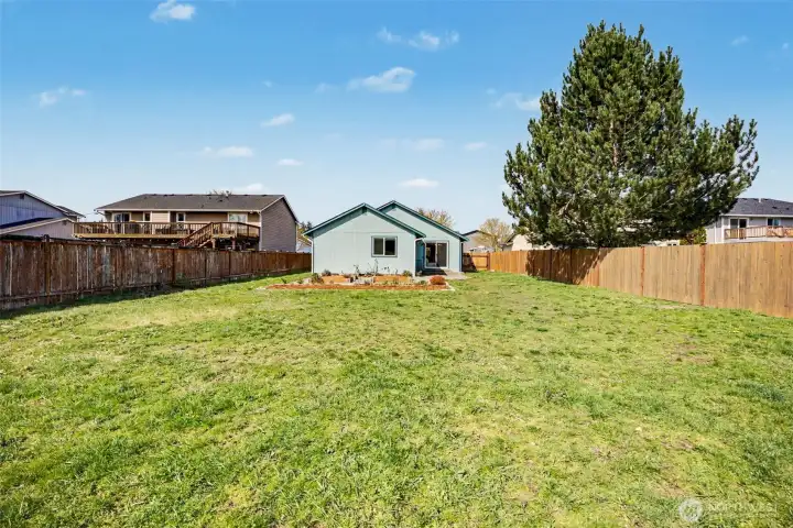 Very large backyard with no neighbors behind you!