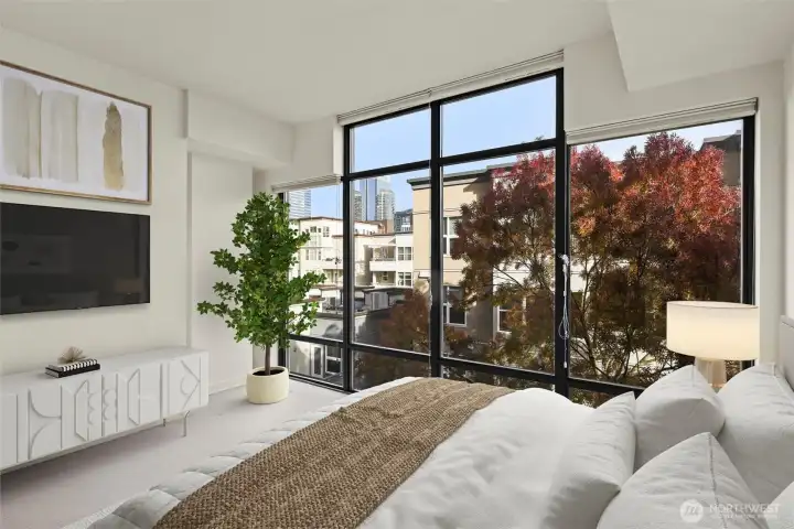 Tons of natural light accompanied with window coverings.