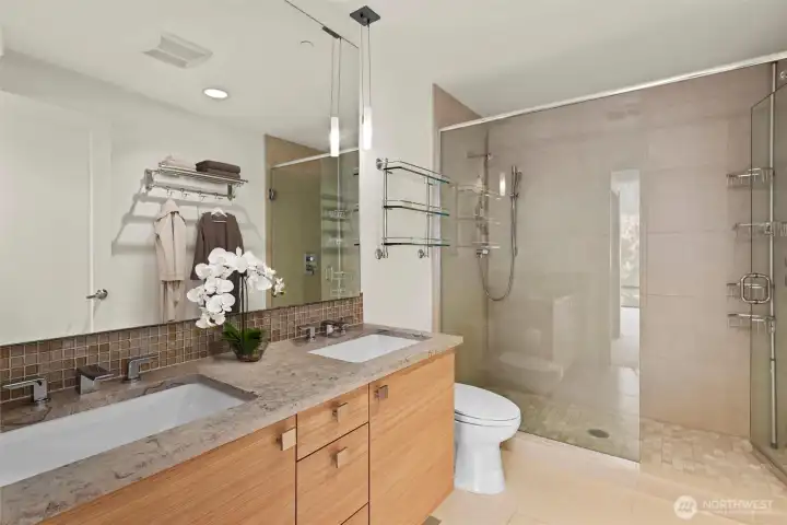 Dual sink stations. Spa inspired walk in shower.