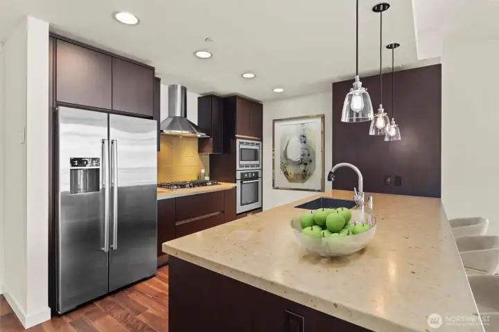 Honed granite with breakfast bar.
