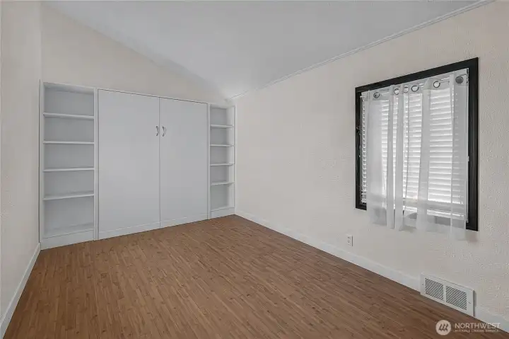 ADU bedroom with murphy bed - unstaged