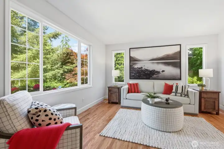 New and refinished hardwood floors throughout the main living areas.