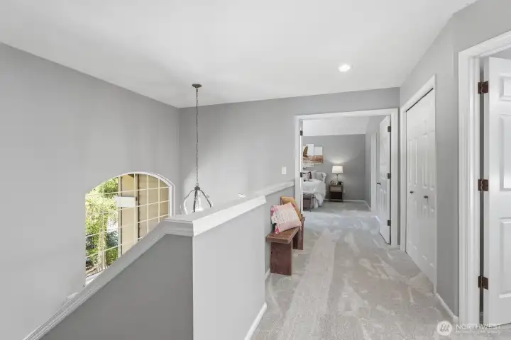 Brand-new carpet extends throughout the upstairs hallway and bedrooms.