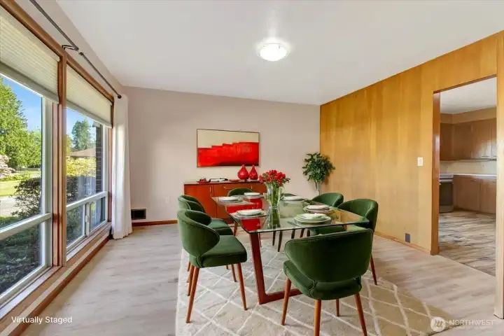 Virtually staged dining room. Custom paneled wall brings in that mid-century modern charm. Virtually staged dining room. Custom paneled wall brings in that mid-century modern charm.