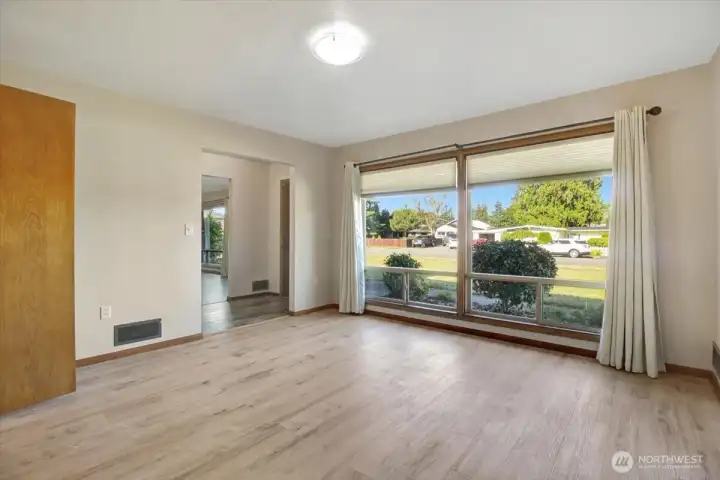 Another view of the spacious dining room looking out to the front yard. Another view of the spacious dining room looking out to the front yard.