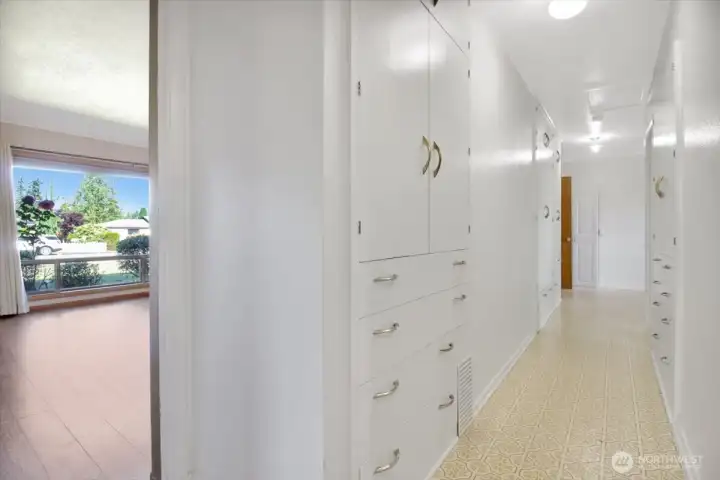 Full hallway of custom built in cabinets. So much great storage space! Full hallway of custom built in cabinets. So much great storage space!