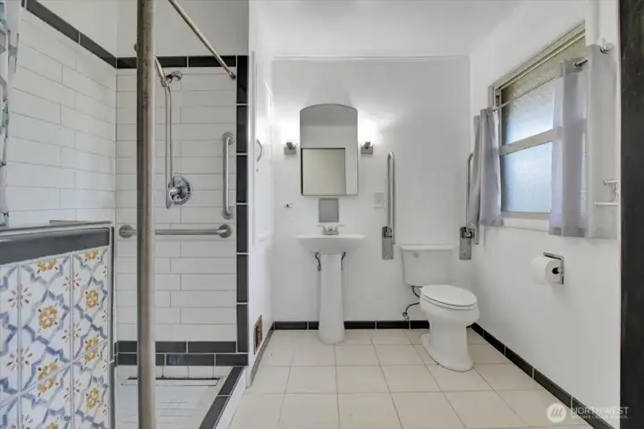 3/4 bath with more built in cabinetry. Currently configured to be accessible. 3/4 bath with more built in cabinetry. Currently configured to be accessible.