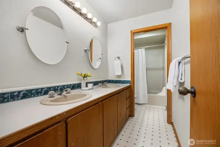 There is a full bath across the hall from the 3 bedrooms.