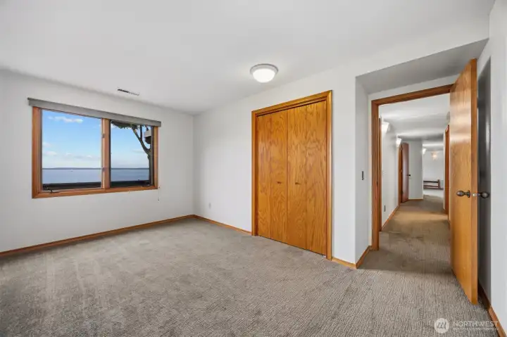 The bedroom at the end of the hall is very large, and all the bedrooms have amazing salt water views.