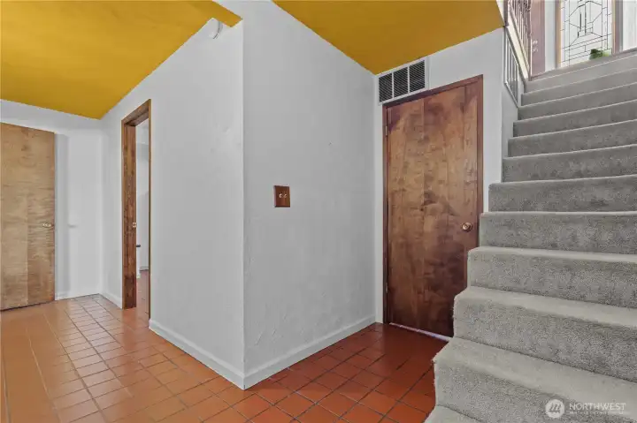Basement: Staircase from Main Level leads to: Storage Closet, then Catering (Potential) Kitchen/Living, then Hallway to Guest Suite: Closet, Wine Storage, Full Bath and Bedroom.