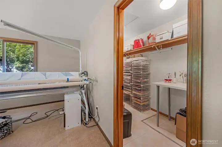 Main Floor Primary suite walk-in closet.