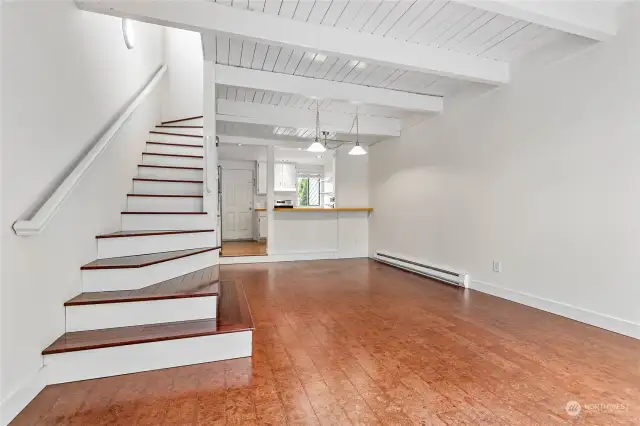 Tall ceilings with white wood plank details give it that beachy vibe.