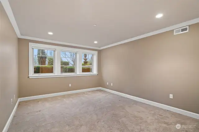 Lower level guest bedroom with ensuite bath