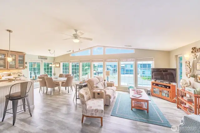 Upstairs find a comfortable great room with tons of natural light.