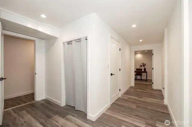 View from bottom of stairs to "common area" between lower level 2 bedroom 3/4 Bath private entrance daylight basement.