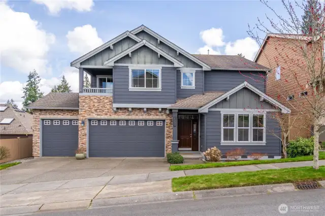 Welcome home - rare 4 car tandem garage with tons of storage!