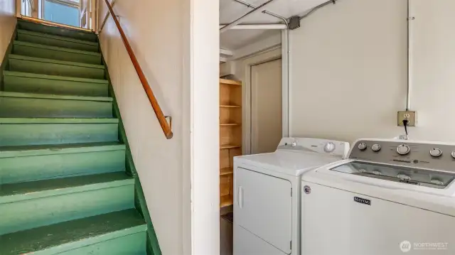 Stairwell still connects the two floors.  There is a laundry and storage area that separates the two.  Each unit has a door that locks to this shared space.