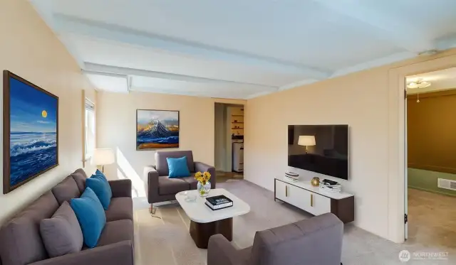 Downstairs: Living room, virtually staged.