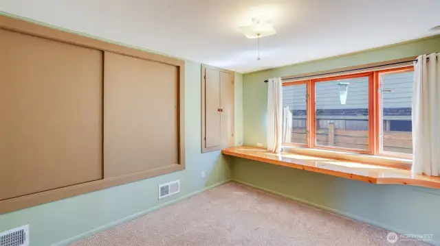 Downstairs: Bedroom with built-in desk.