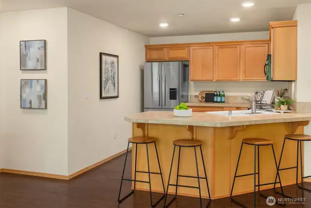 Open Kitchen w/ Counter Level Seating.