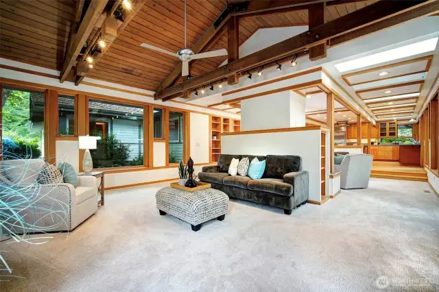Family Room with windows showcasing the lovely outdoors on each side.