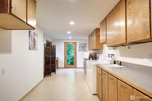 Enormous Laundry Room with outdoor access. Lots of storage room!