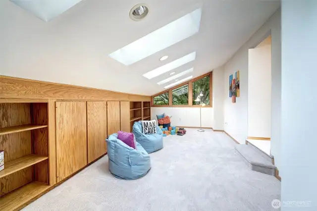 A great space for play and hanging out with friends, Bonus Room with built-ins.