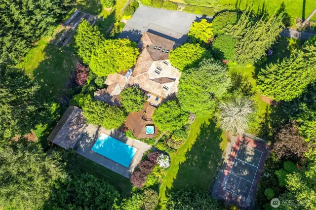 Pool, sport court for pickleball, decks..the entertaining lifestyle.