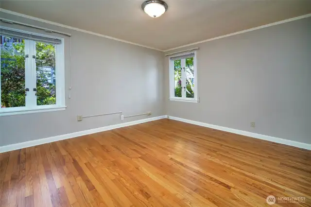 This is the second main floor bedrooms. Both have Oak floors and are located at the back of the house. Quiet and peaceful.