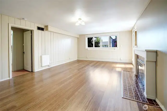 This view of the Family Room shows the door leading to the lower level kitchen.