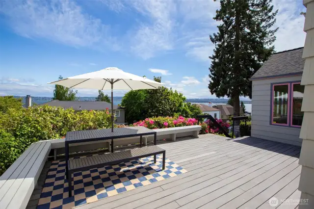 This front deck floats above the street, with easy access to the entry and also connects to the kitchen.