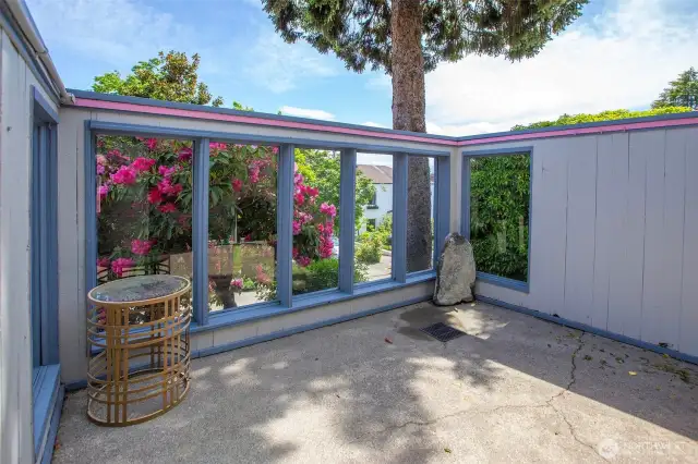 This is the enclosed front patio, with the main access from the lower level Family Room.