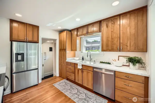 Wide open kitchen is gorgeous as well as functional and easy to work in.