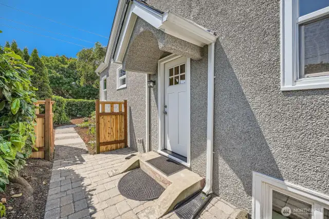 Side entrance to the home lets you right into the kitchen or the lower level - making grocery trips a breeze!